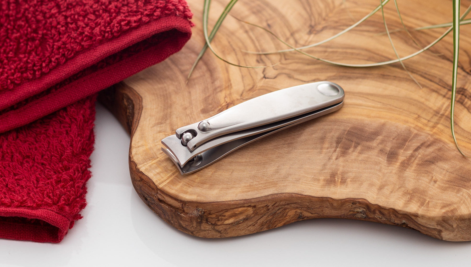 Nail clippers on wooden surface