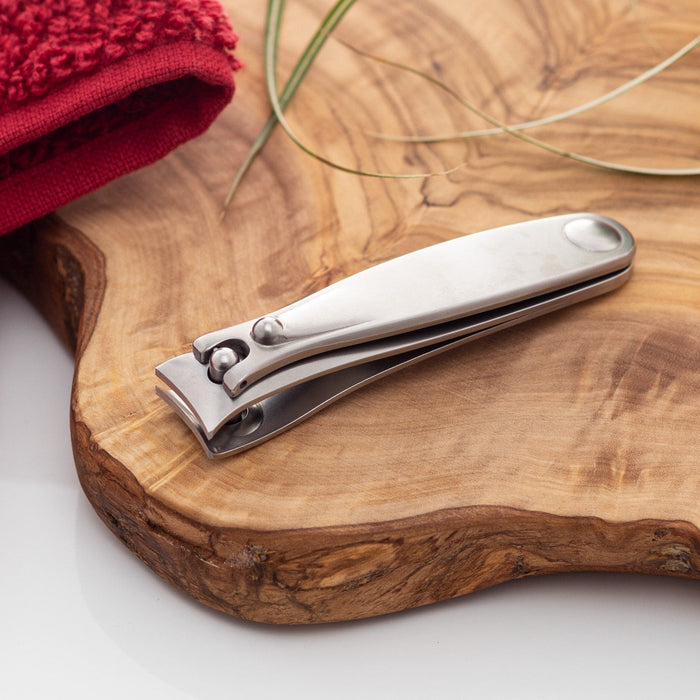 Nail clippers on wooden surface
