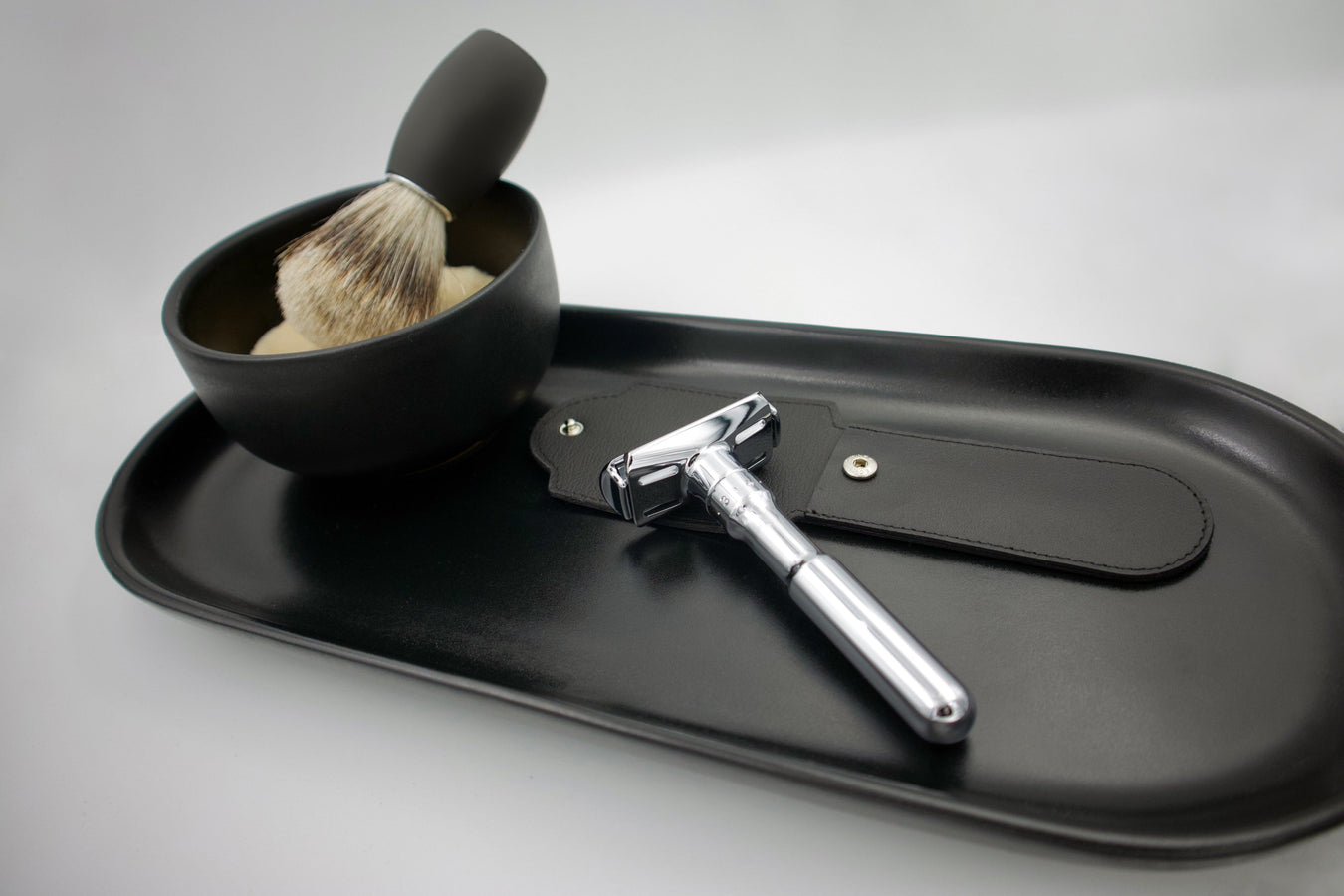 Premium men's shaving essentials including razors, brushes, creams, and grooming kits from top global brands