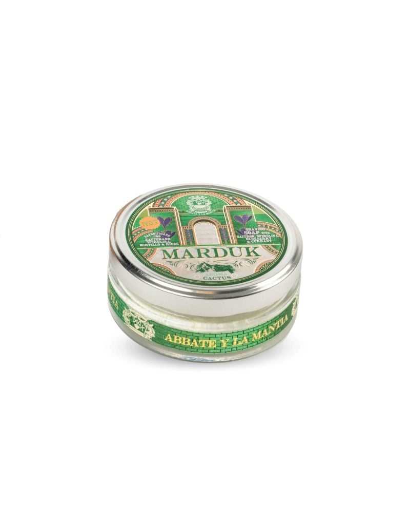 A can of Abbate y La Mantia Marduk Shaving Soap with a green label featuring a classical illustration.