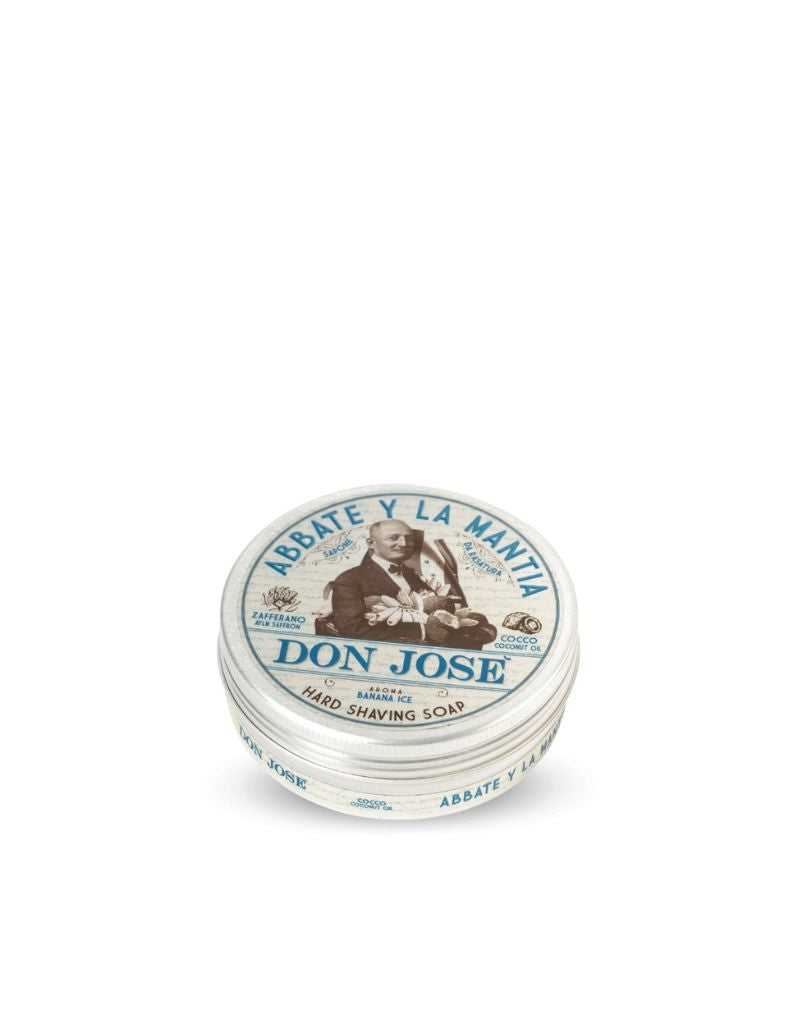 A round container of 'Abbate y La Mantia - Don Jose' hard shaving soap with a label featuring an image of a man and the text 'Hard Shaving Soap'.