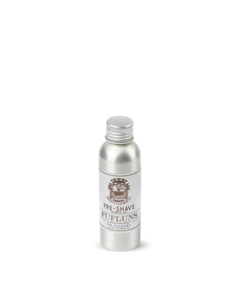 A bottle of Abbate y La Mantia Fufluns Pre-Shave Oil with a label showing the brand logo, product name, and additional details.