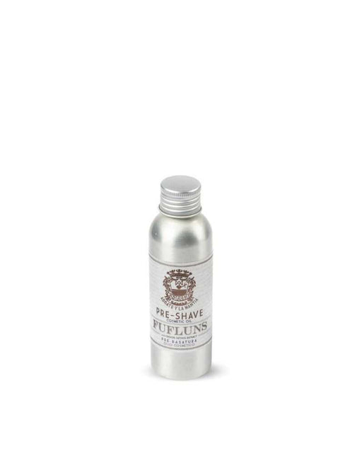 A bottle of Abbate y La Mantia Fufluns Pre-Shave Oil with a label showing the brand logo, product name, and additional details.
