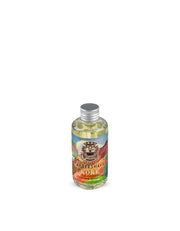 A bottle of Abbate y La Mantia Koke Alcoholic Aftershave Lotion with a label featuring a lion and the product information.