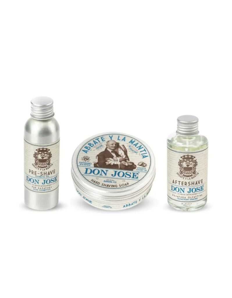 The image shows three products from the Shaving Routine Don José set: a pre-shave oil bottle, a shaving soap container, and an aftershave lotion bottle, all labeled 'DON JOSE'.