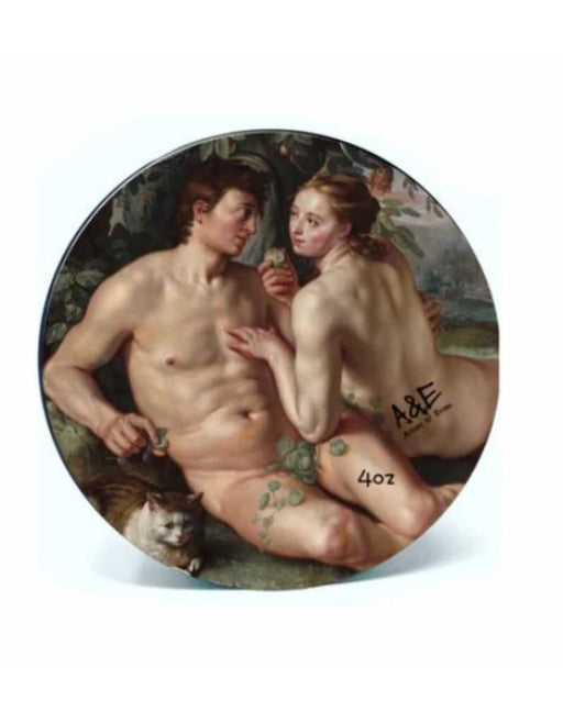 Decorative plate with classical painting of two nude figures and a cat, featuring brand 'A&E' and labeled "Forbidden Fruit Shaving Soap".