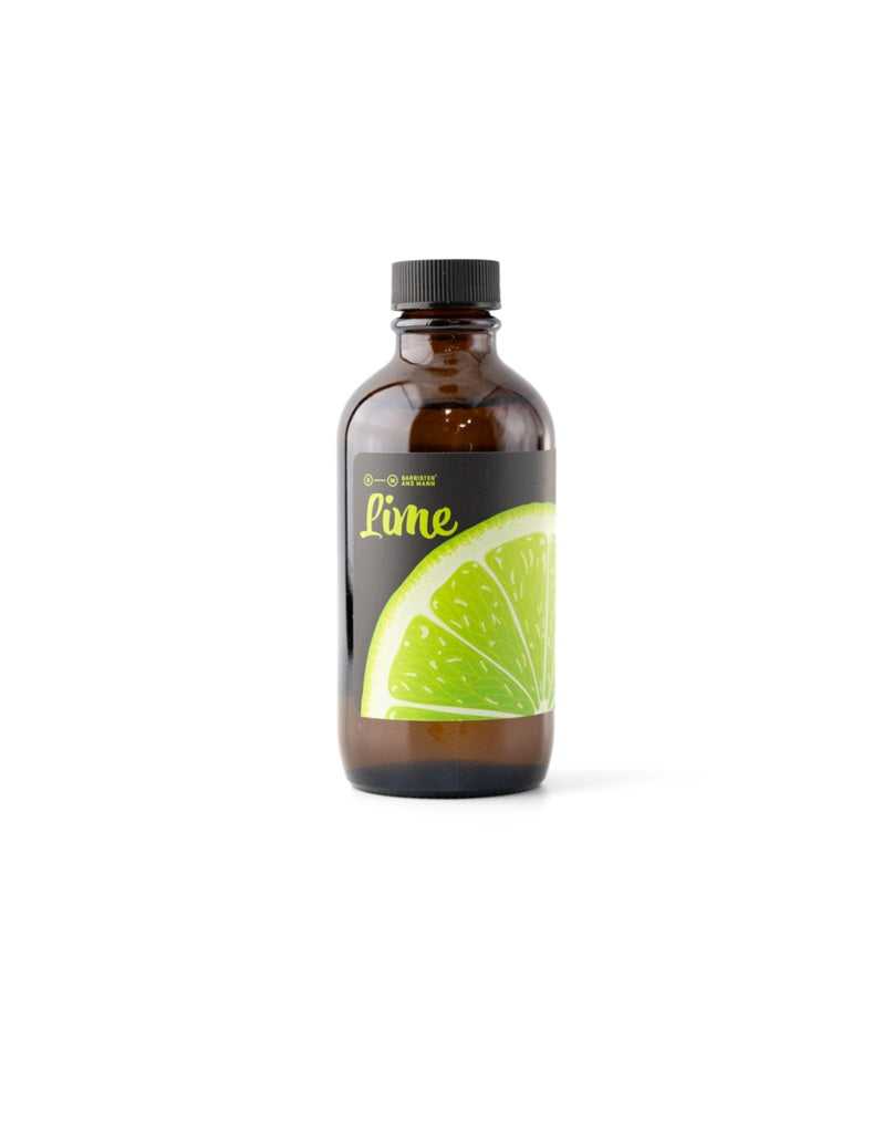 A bottle of Barrister and Mann Lime aftershave splash with a clear label showing a slice of lime and the brand's name.
