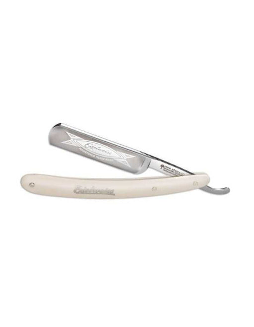 A straight razor with a white handle featuring a nickel silver inlay with floral pattern and 'Boker' branding, and a partially polished blade with etching.