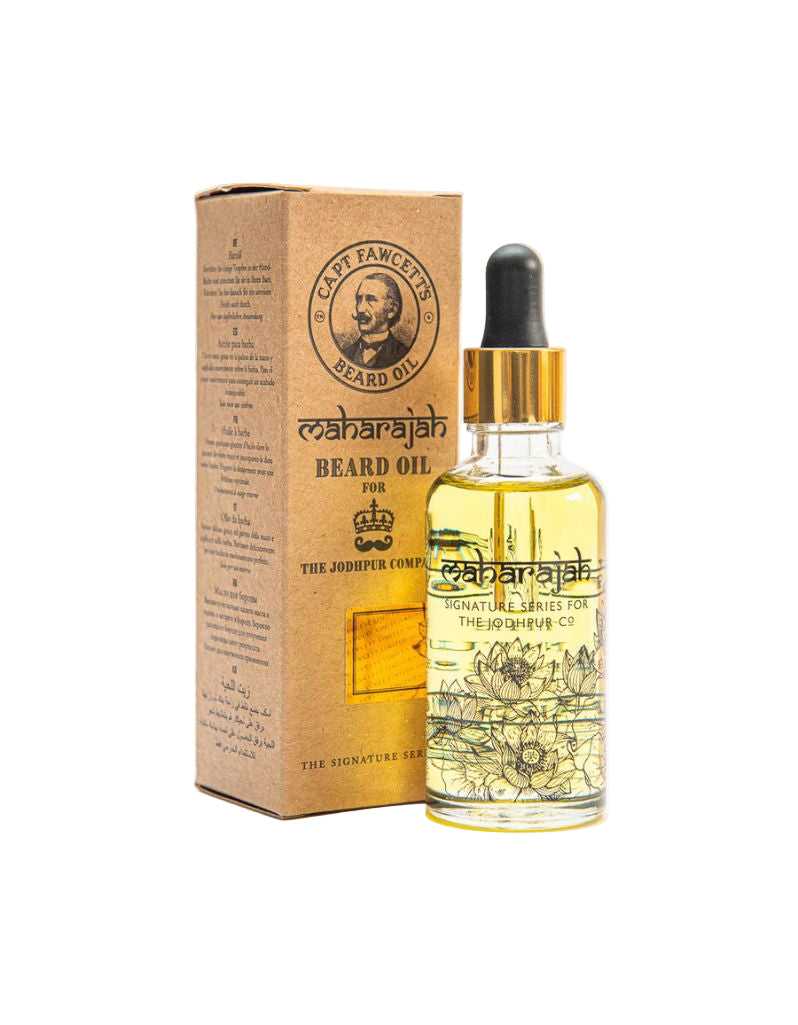 Beard oil bottle with dropper and packaging on a white background