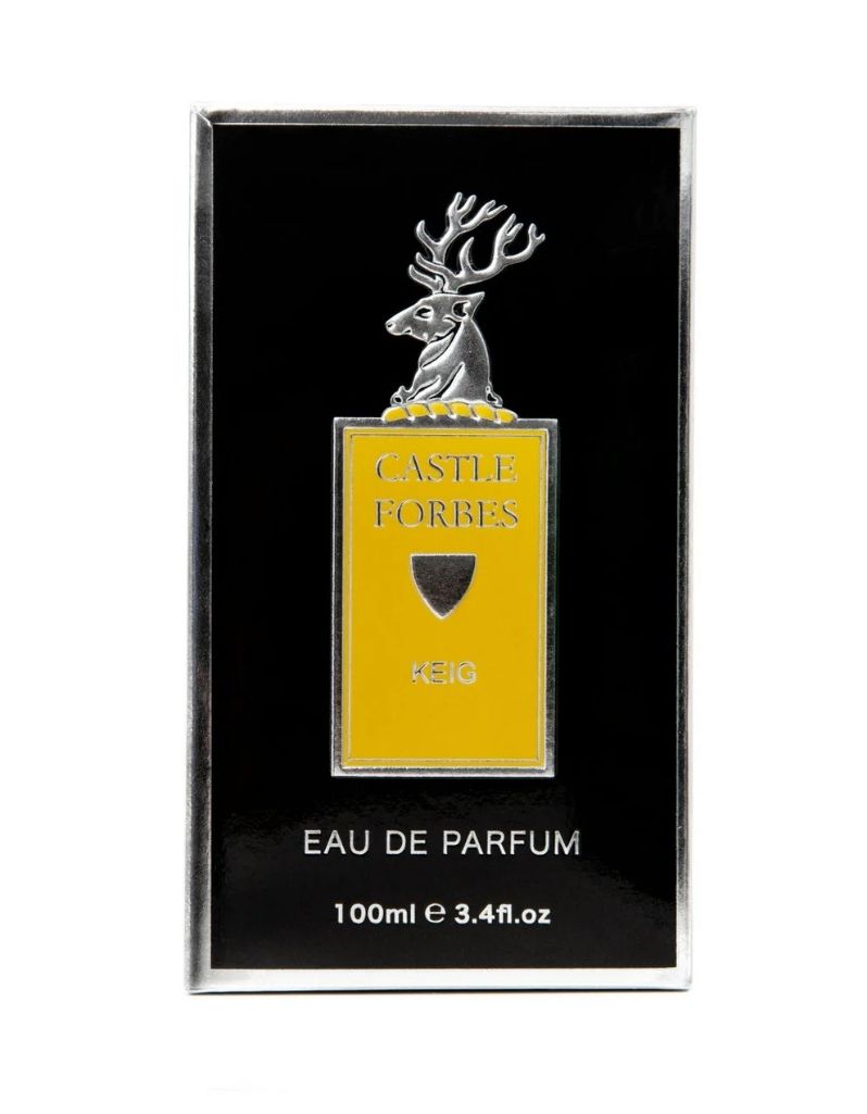 A 100ml bottle of Castle Forbes Eau de Parfum in a rectangular black presentation box with a silver border. The center features a yellow rectangular bottle graphic with a silver stag emblem on top and the text 'CASTLE FORBES' and 'KEIG EAU DE PARFUM'.