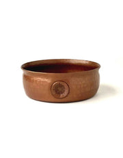 Hammered copper shaving bowl with ridged interior, flared rim, and thumb rest for grip and fast, contained lathering.