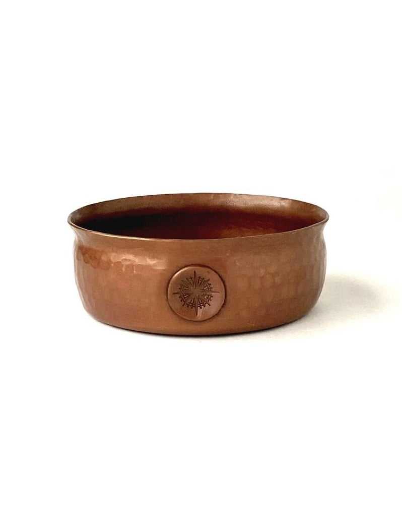 Hammered copper shaving bowl with ridged interior, flared rim, and thumb rest for grip and fast, contained lathering.