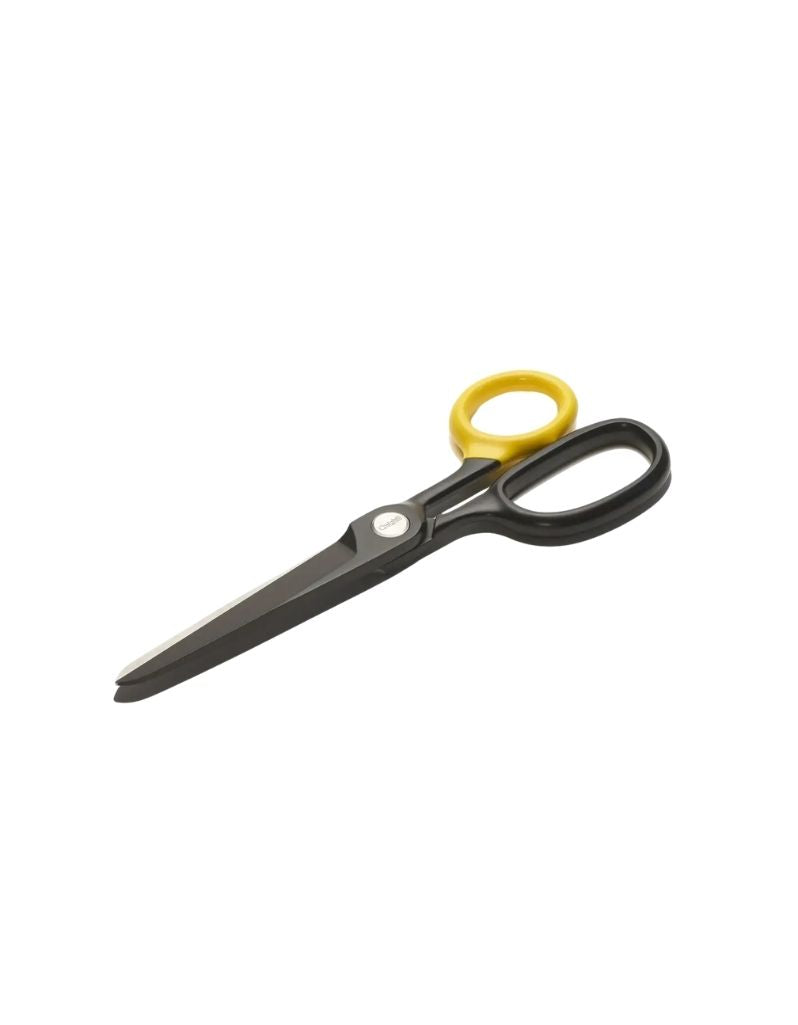Black scissors with a yellow ring handle, shown on a plain white background.