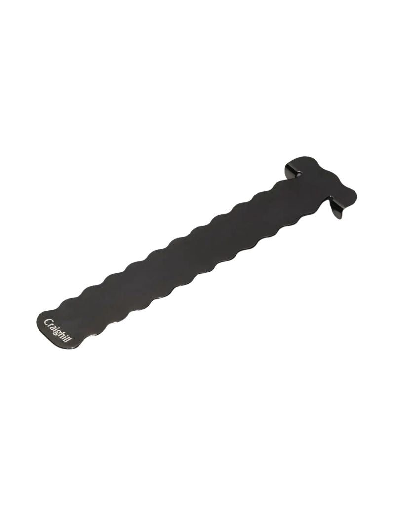 A black book mark with a wavy profile 