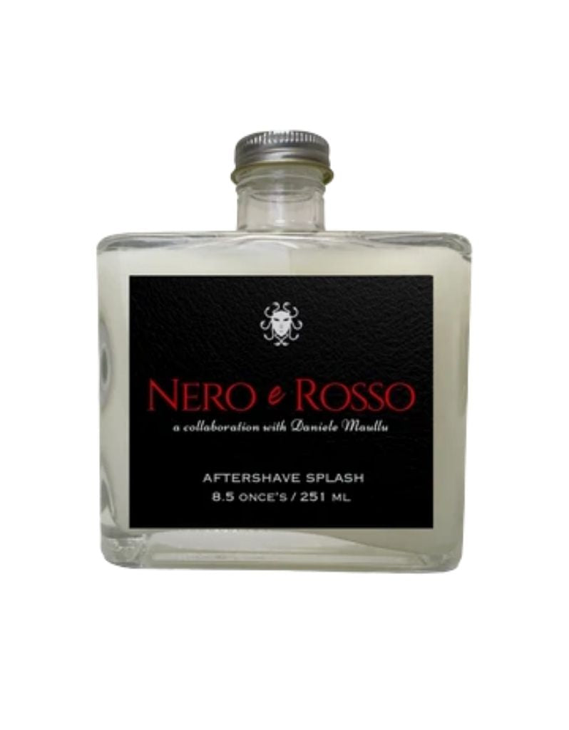 A clear glass bottle of Nero & Rosso Aftershave Splash with a black label and silver cap, shown on a white background.