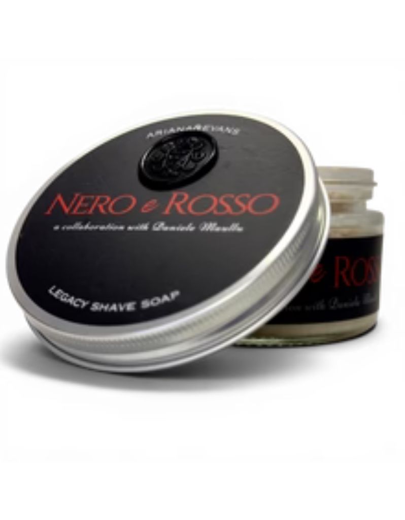 A silver metal tin of Ariana Evans Nero e Rosso Legacy Shave Soap, shown with its lid leaning against the open jar, on a clean white background.