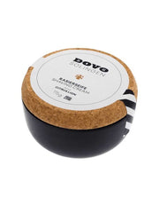 Dove & Solingen shaving cream container with cork lid on a white background