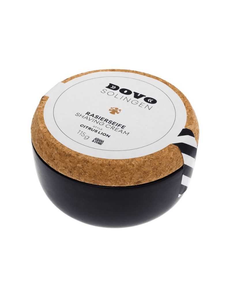 Dove & Solingen shaving cream container with cork lid on a white background
