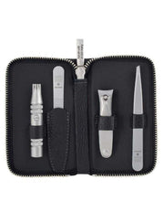 Manicure set with various tools in a black case on a white background