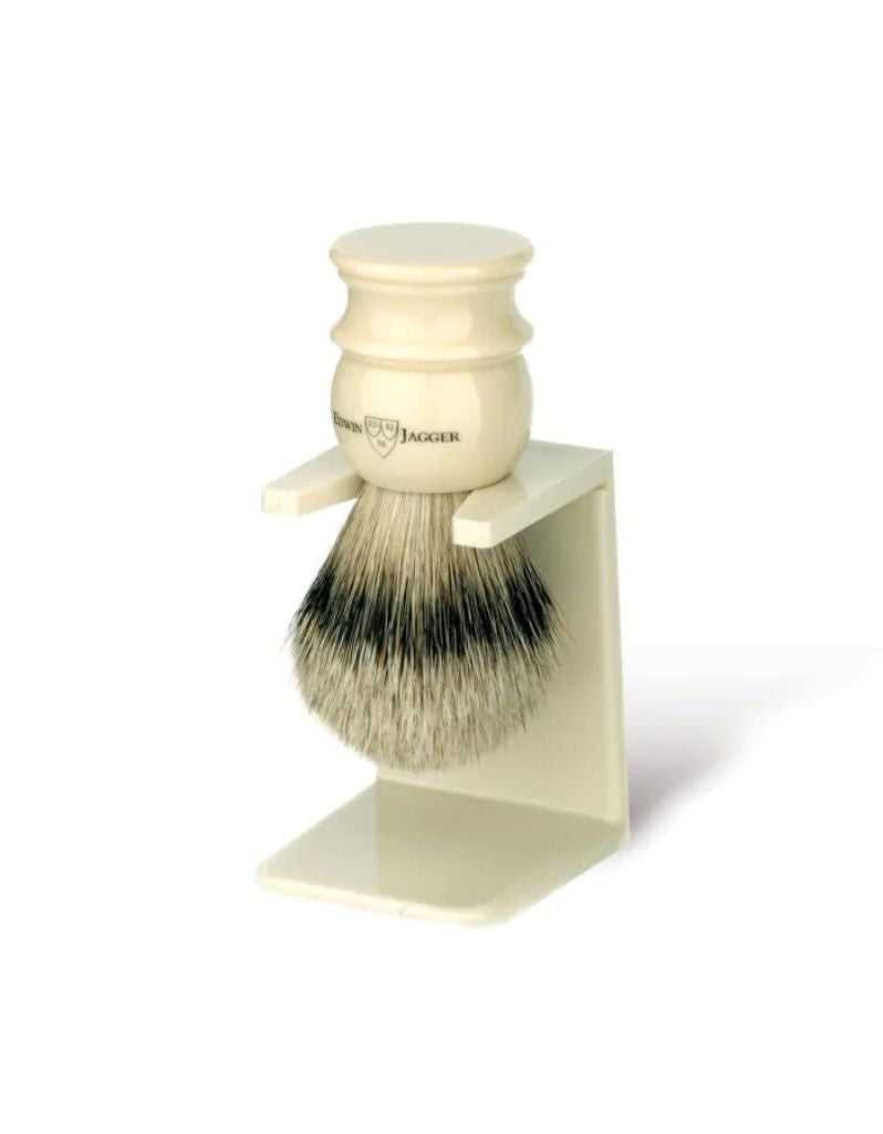 Edwin Jagger Silvertip Badger Shaving brush with a matching ivory stand on a white background