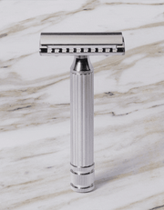 Fatip l’Ibrido Classic chrome safety razor rotating to show both sides of its hybrid open and closed comb head