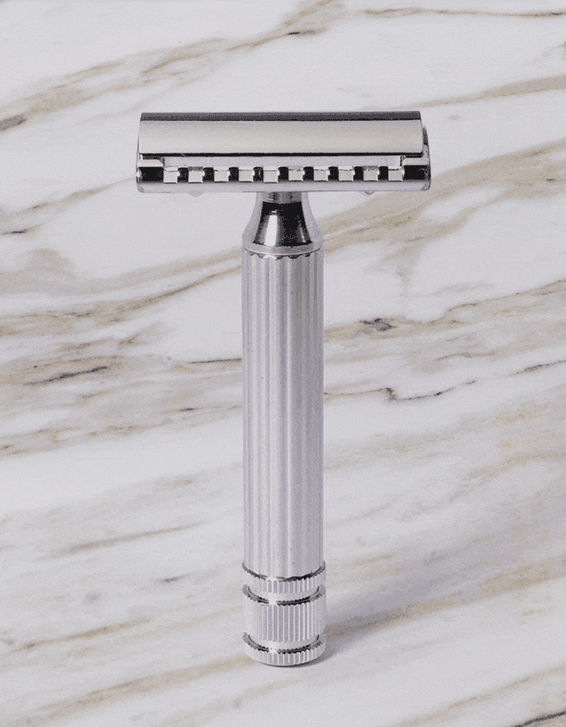 Fatip l’Ibrido Classic chrome safety razor rotating to show both sides of its hybrid open and closed comb head