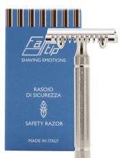Fatip il Piccolo open comb safety razor in nickel standing in front of its blue Made in Italy gift box