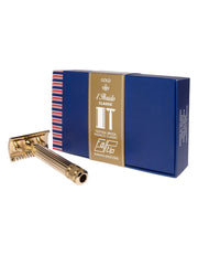 Fatip l’Ibrido Classic gold safety razor with a fluted handle, shown in front of its blue gift box