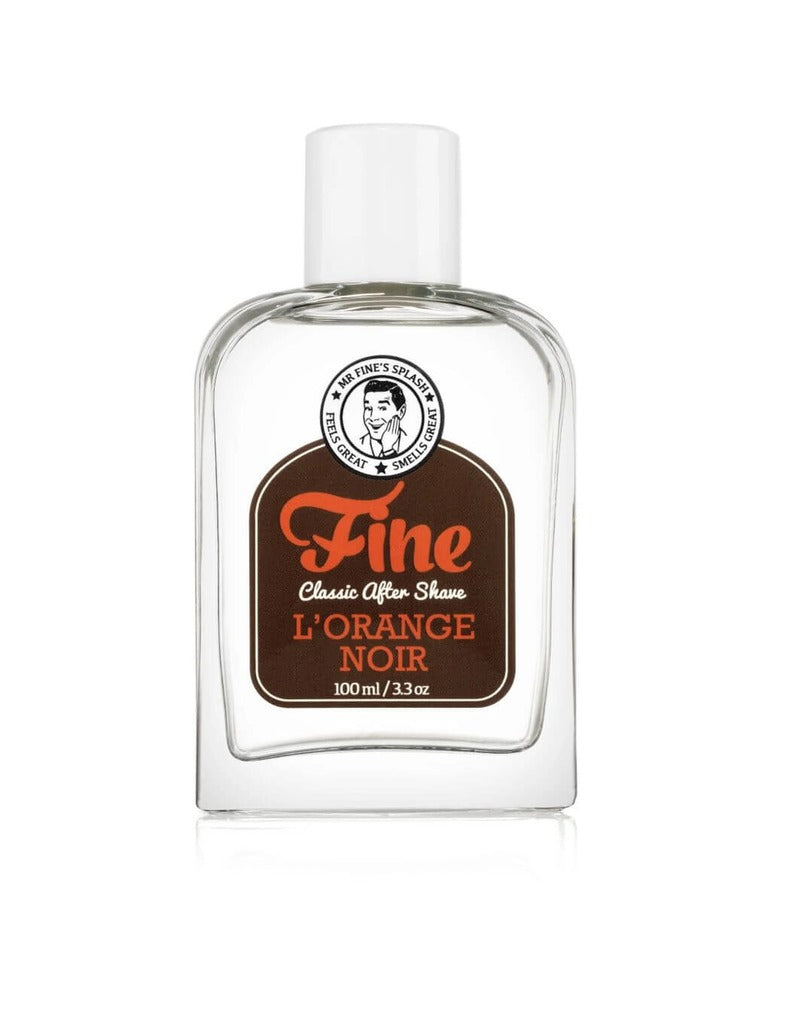 Fine Accoutrements L'Orange Noir aftershave in a clear 3.3 oz glass bottle with white cap