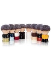 Row of Fine Stout synthetic shaving brushes showing the range of two tone handle colors