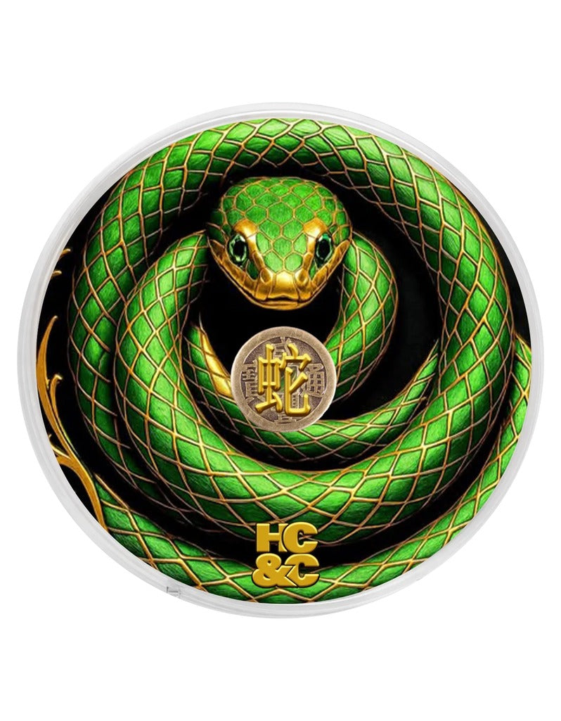Hendrix Classics & Co. Year of The Snake Shave Soap lid with a coiled green and gold snake around a Chinese coin