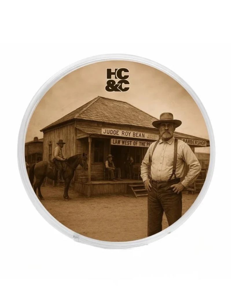 Hendrix Classics & Co. Judge Roy Shave Soap lid with an Old West man outside the Judge Roy Bean saloon
