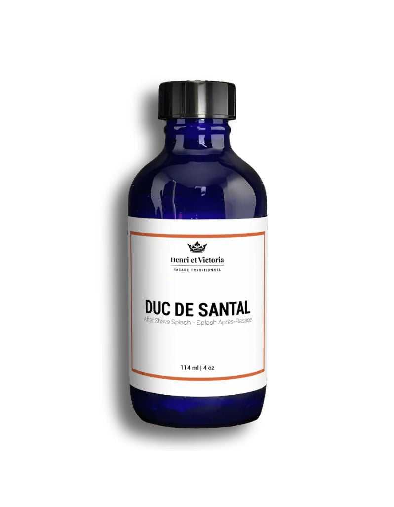 Blue bottle of Duc de Santal with a white label on a white background