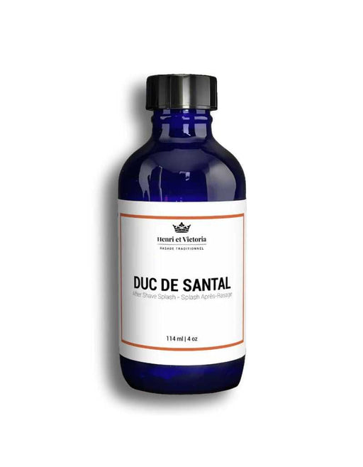 Blue bottle of Duc de Santal with a white label on a white background