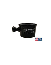 A black stoneware apothecary shave mug with the brand 'Parker' written on the side, along with the flag of the USA.