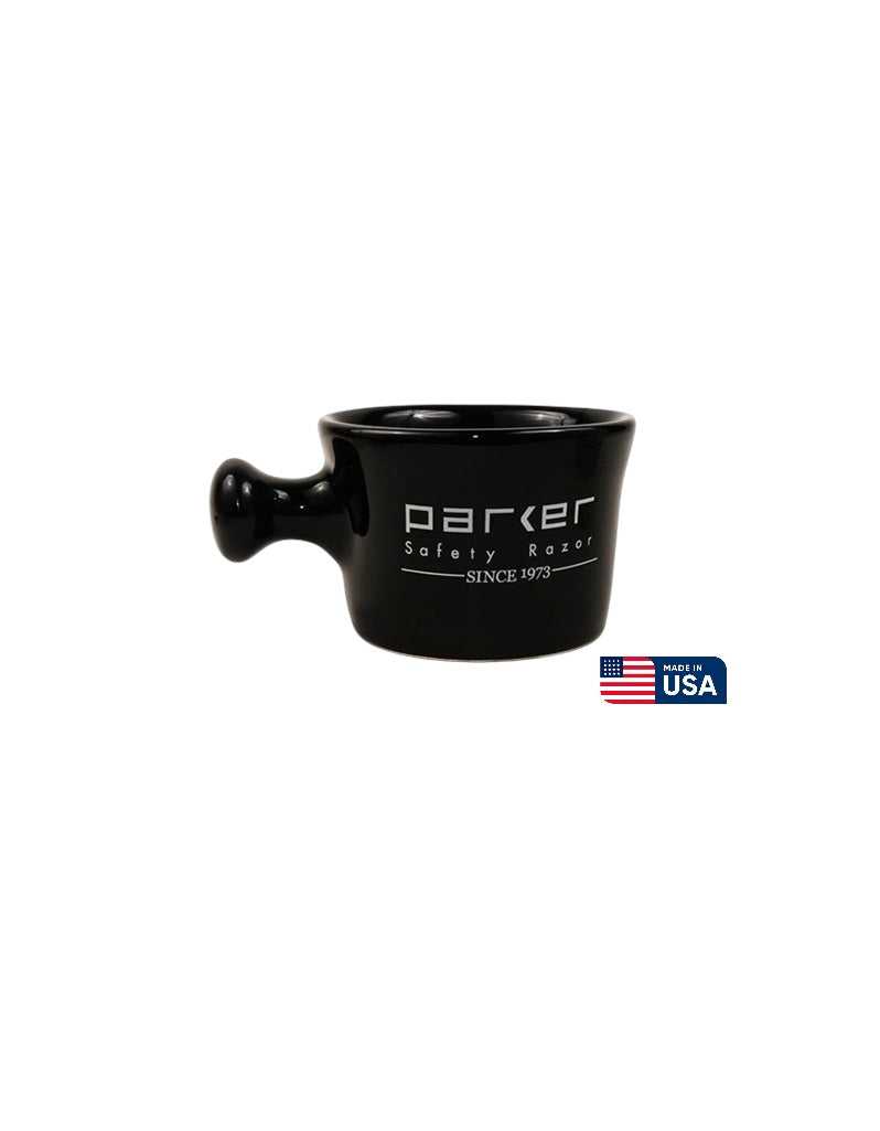 A black stoneware apothecary shave mug with the brand 'Parker' written on the side, along with the flag of the USA.