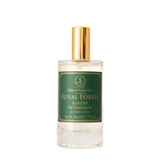 A bottle of Taylor of Old Bond Street Royal Forest luxury aftershave lotion with a green label and a gold-colored cap.