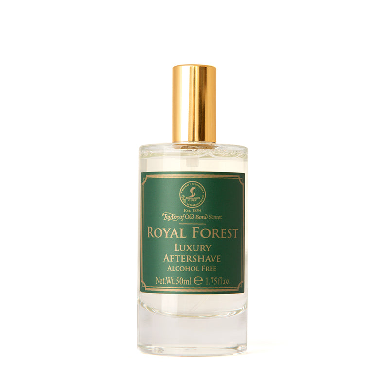 A bottle of Taylor of Old Bond Street Royal Forest luxury aftershave lotion with a green label and a gold-colored cap.