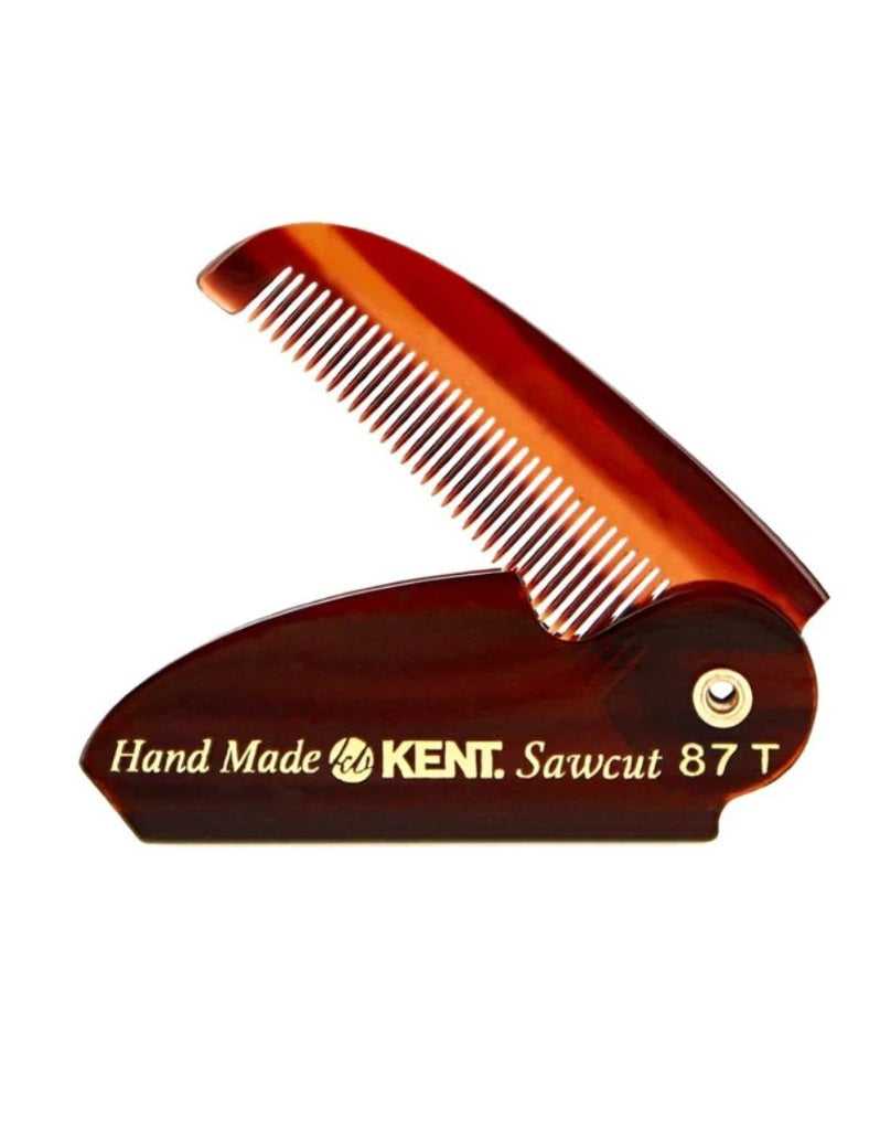 A folded blackKent brand beard and moustache comb with the text 'Hand Made KENT Sawcut 87 TG' on the side.