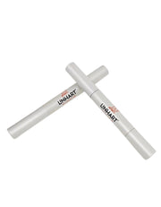Two capped Linhart NYC Whitening Pens in silver, sized for pocket or bag