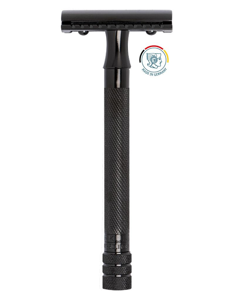 Merkur 23 Black metal safety razor with a textured grip handle, shown vertically against a plain white background. A circular 'Made in Germany' emblem is displayed in the upper right corner.
