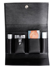 Travel razor kit with black leather case and accessories