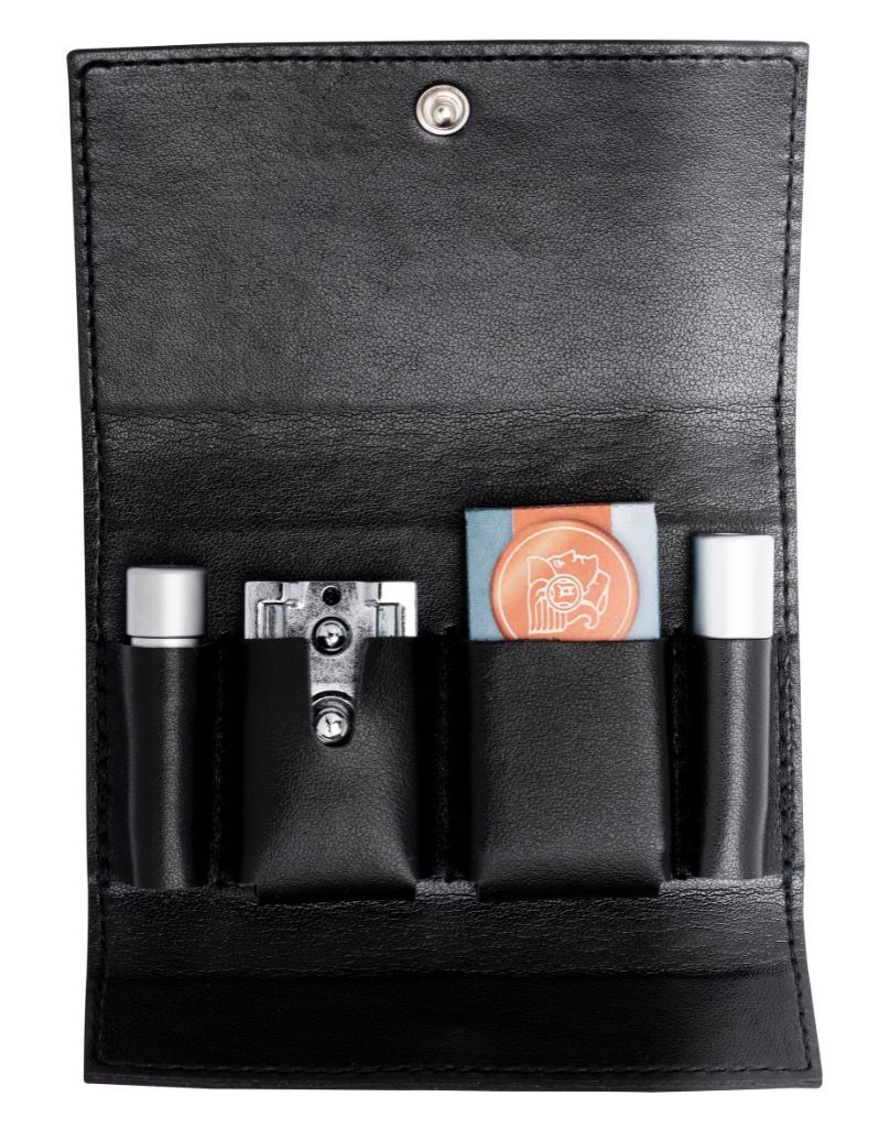 Travel razor kit with black leather case and accessories
