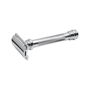 A long-handled, chrome-plated safety razor with a fluted handle and a straight razor head. Merkur 38C