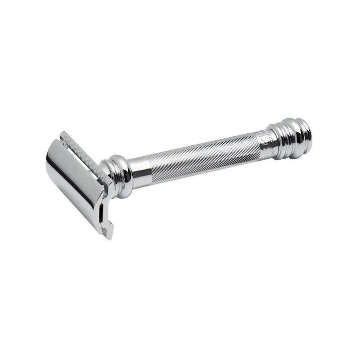 A long-handled, chrome-plated safety razor with a fluted handle and a straight razor head. Merkur 38C