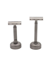 Merkur 4011 Inox razor stand holding two Merkur safety razors on a white background.