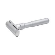 A Merkur Futur adjustable safety razor with a matte chrome finish.