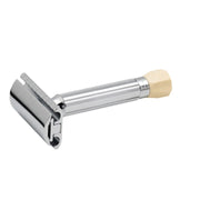 A two-piece adjustable safety razor with a chrome finish and a fluted handle, featuring an ivory-colored adjustment knob.