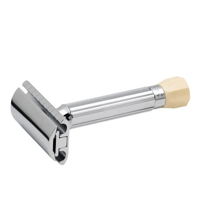 A two-piece adjustable safety razor with a chrome finish and a fluted handle, featuring an ivory-colored adjustment knob.