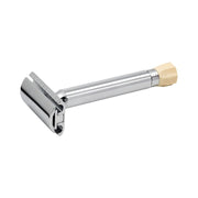 A Merkur Progress Long Handle Adjustable Safety Razor with a chrome-plated brass handle and die-cast zinc razor head.